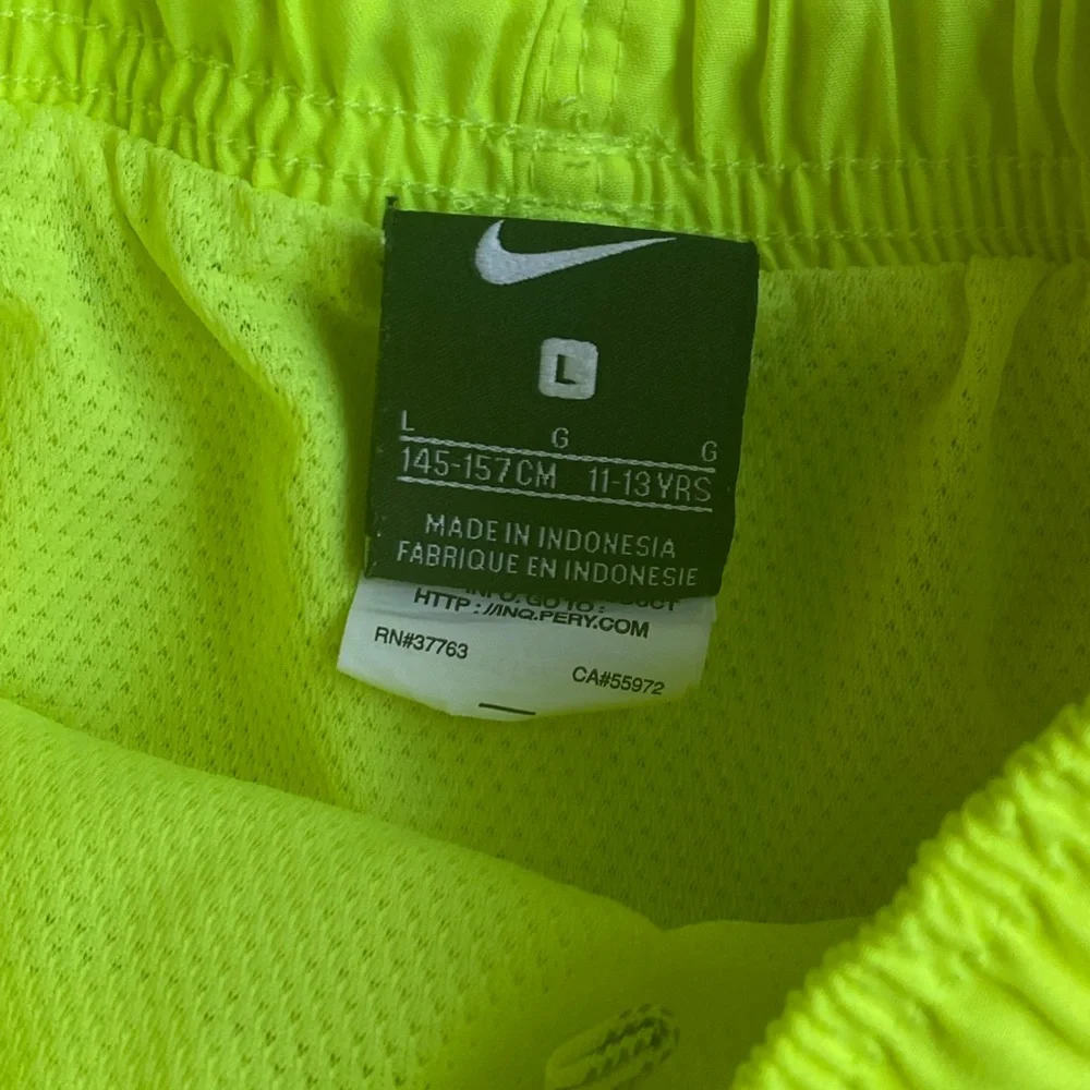 Nike boy swim trunks size L & Cat & Jack top size 12/14 y